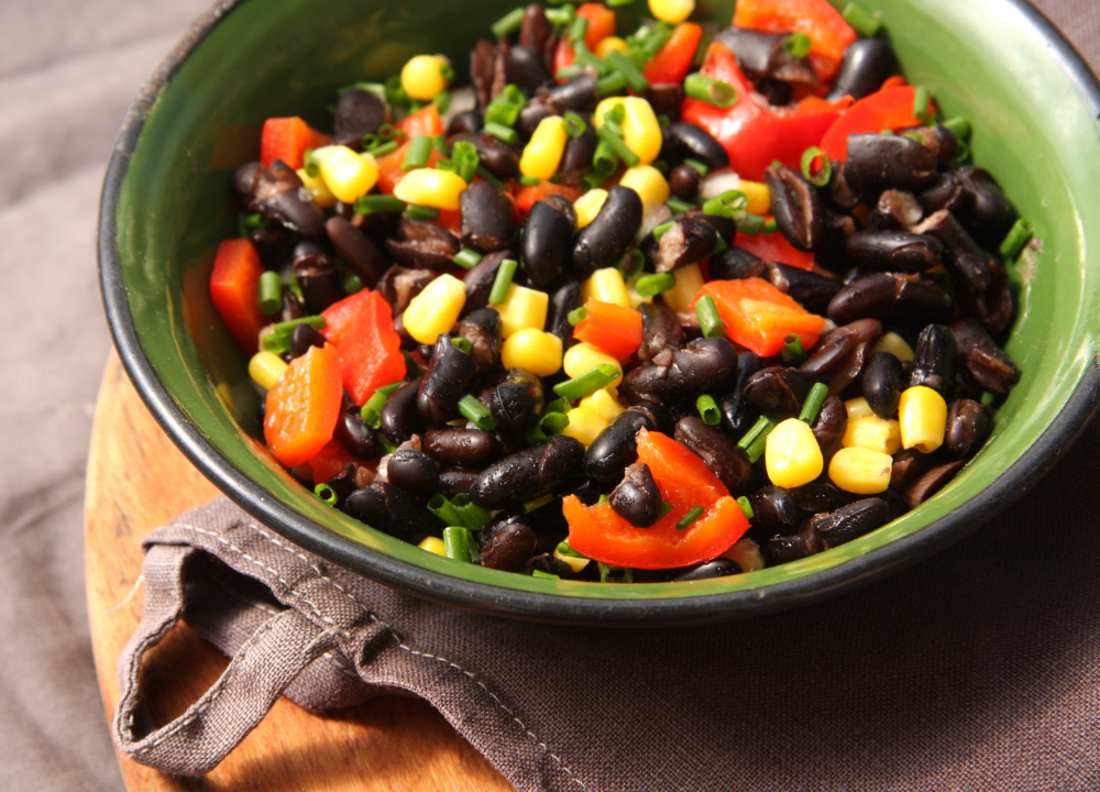 Black beans with corn, bell peppers, and green onions