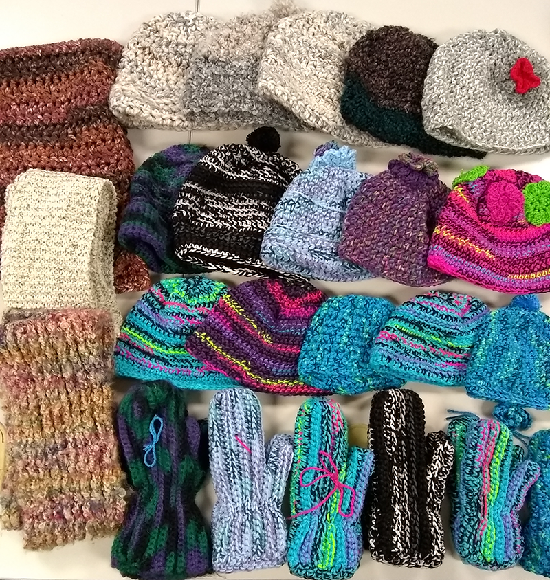 Jean's donation of handmade hats, mittens, and scarves